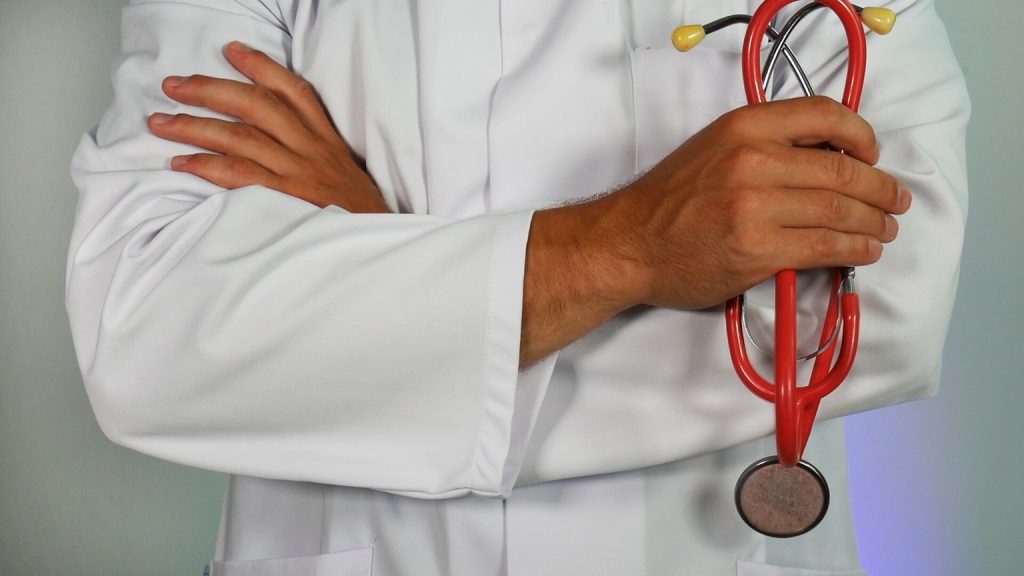 Medicare doctor holding stethoscope